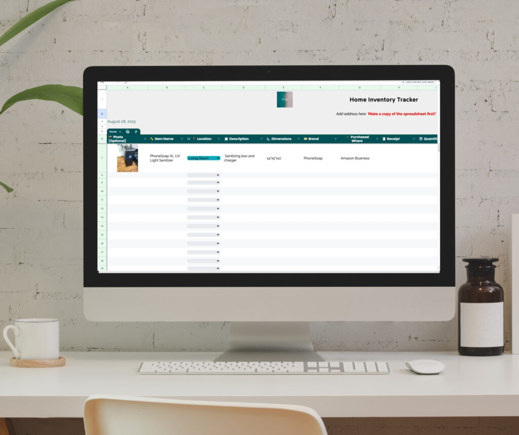 Digital Home Inventory Tracker mockup on laptop screen with minimalist desk decor.