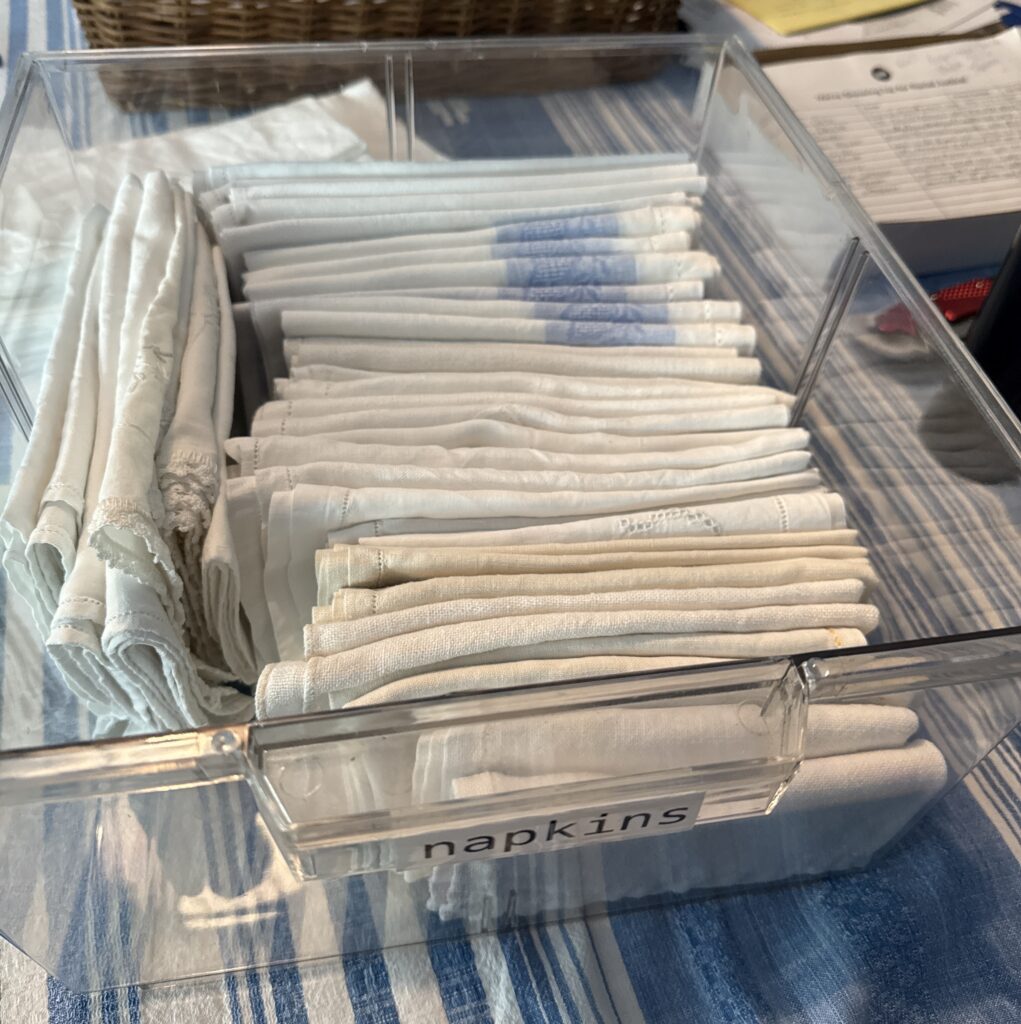 Organized linen and napkin storage system designed to reduce visual clutter and decision fatigue at home.
